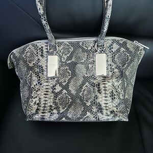 Danier Leather Embossed Snake Purse.